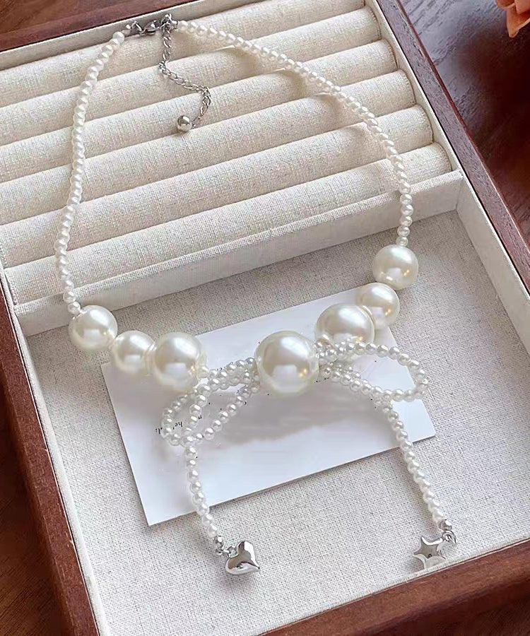 Art White Alloy Pearl Bow Pendant Necklace - Image 2