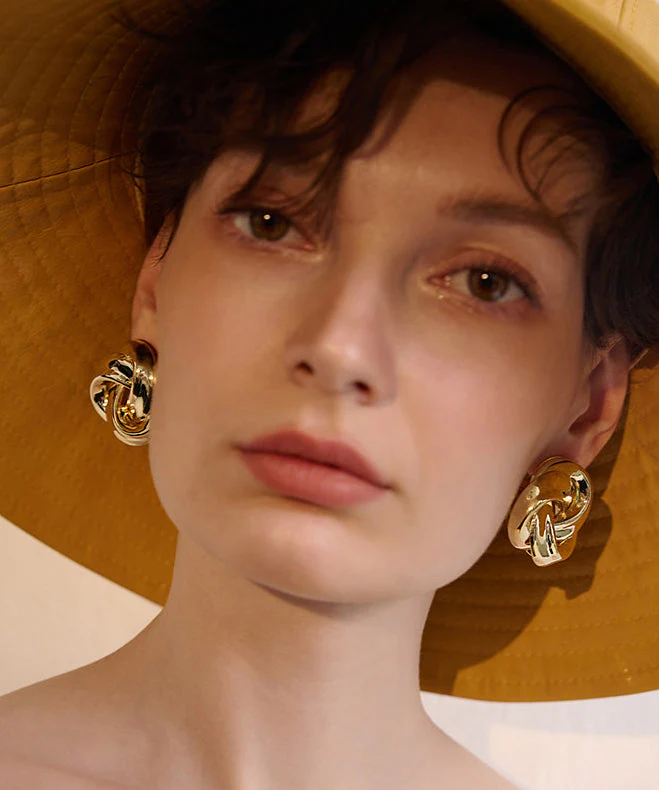 Beautiful Golden Twist Knot Metal Stud Earrings - Image 3