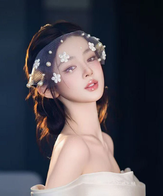 Elegant White Tulle Pearl Floral HairPiece - Image 3