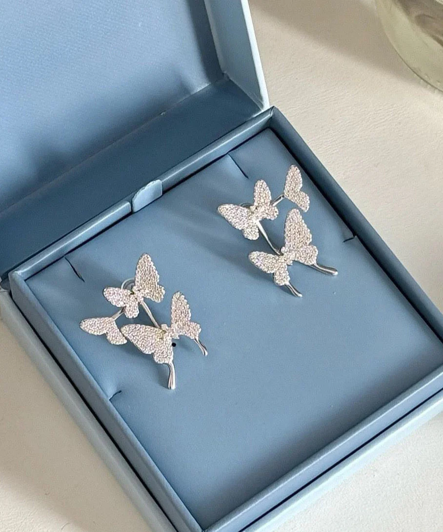 Modern Silk Sterling Silver Zircon Butterfly Stud Earrings - Image 3